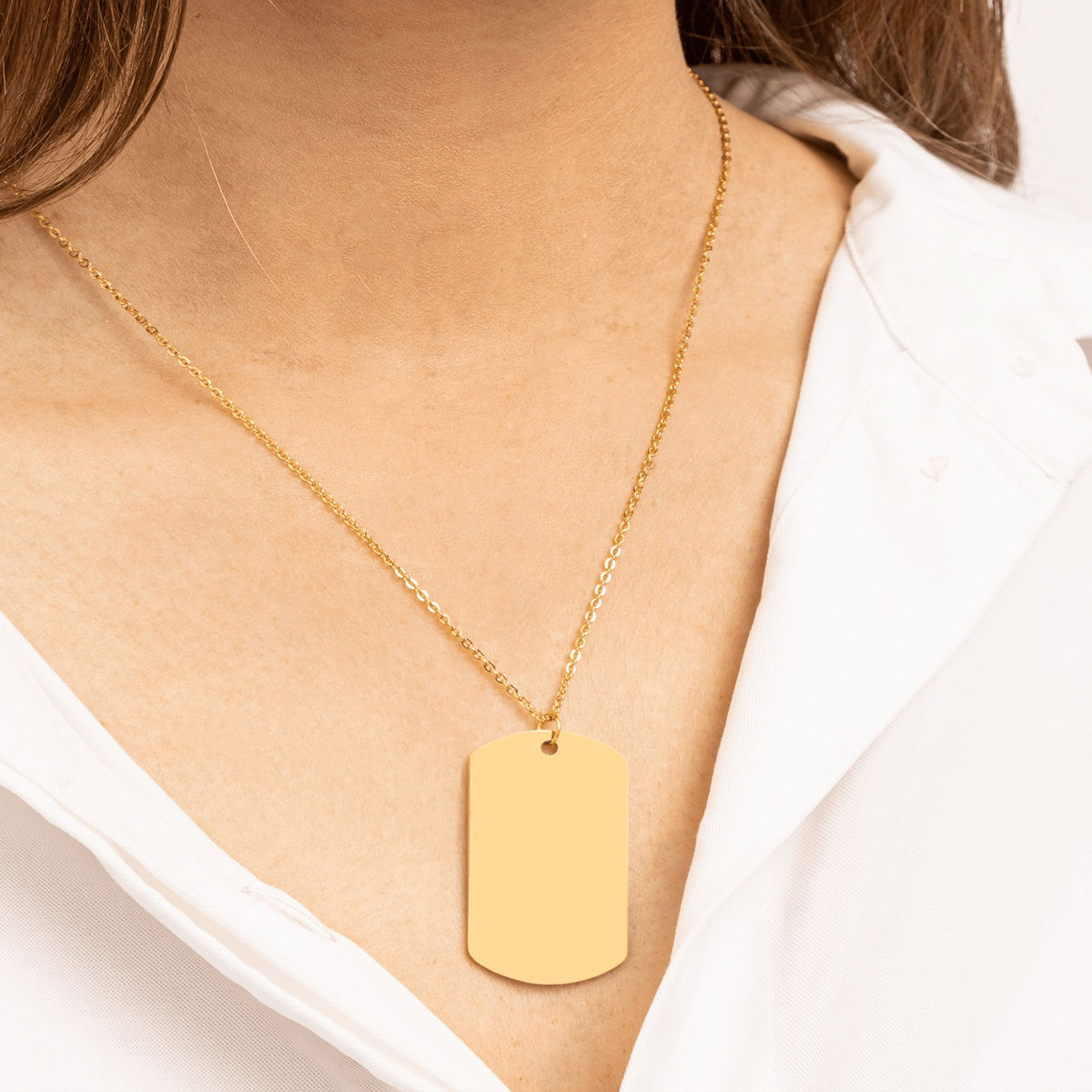 Gold-plated tag pendant necklace, shown blank before engraving (supplier photo)