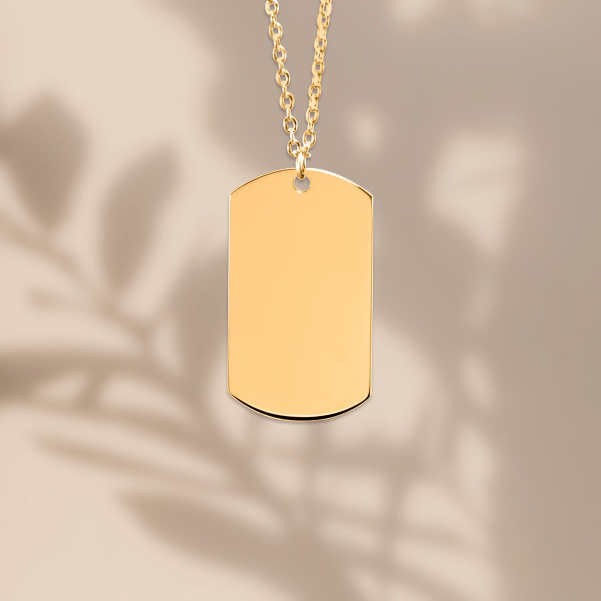 Gold-plated tag pendant necklace, shown blank before engraving (supplier photo)